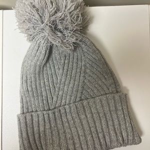 A new day grey beanie with pom